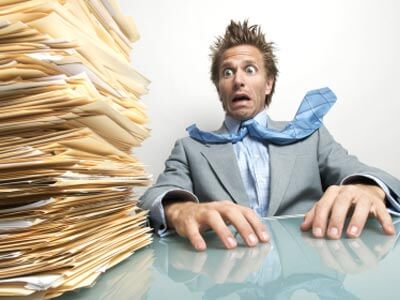 Paper files stack of papers surprised